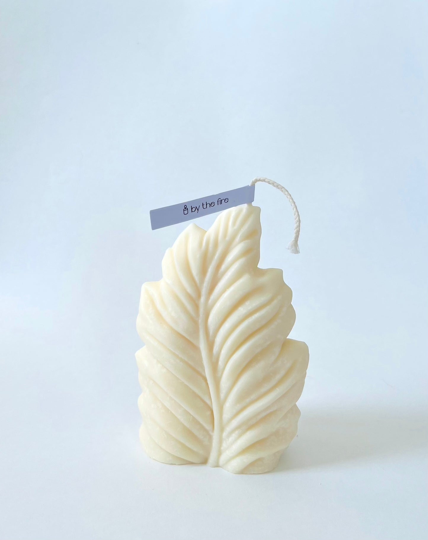 Palm leaf pillar candle